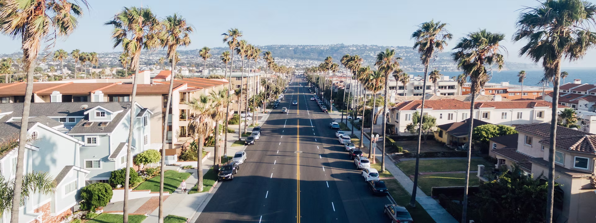 Eye-level view of a Redondo Beach coastline with homes along the shore